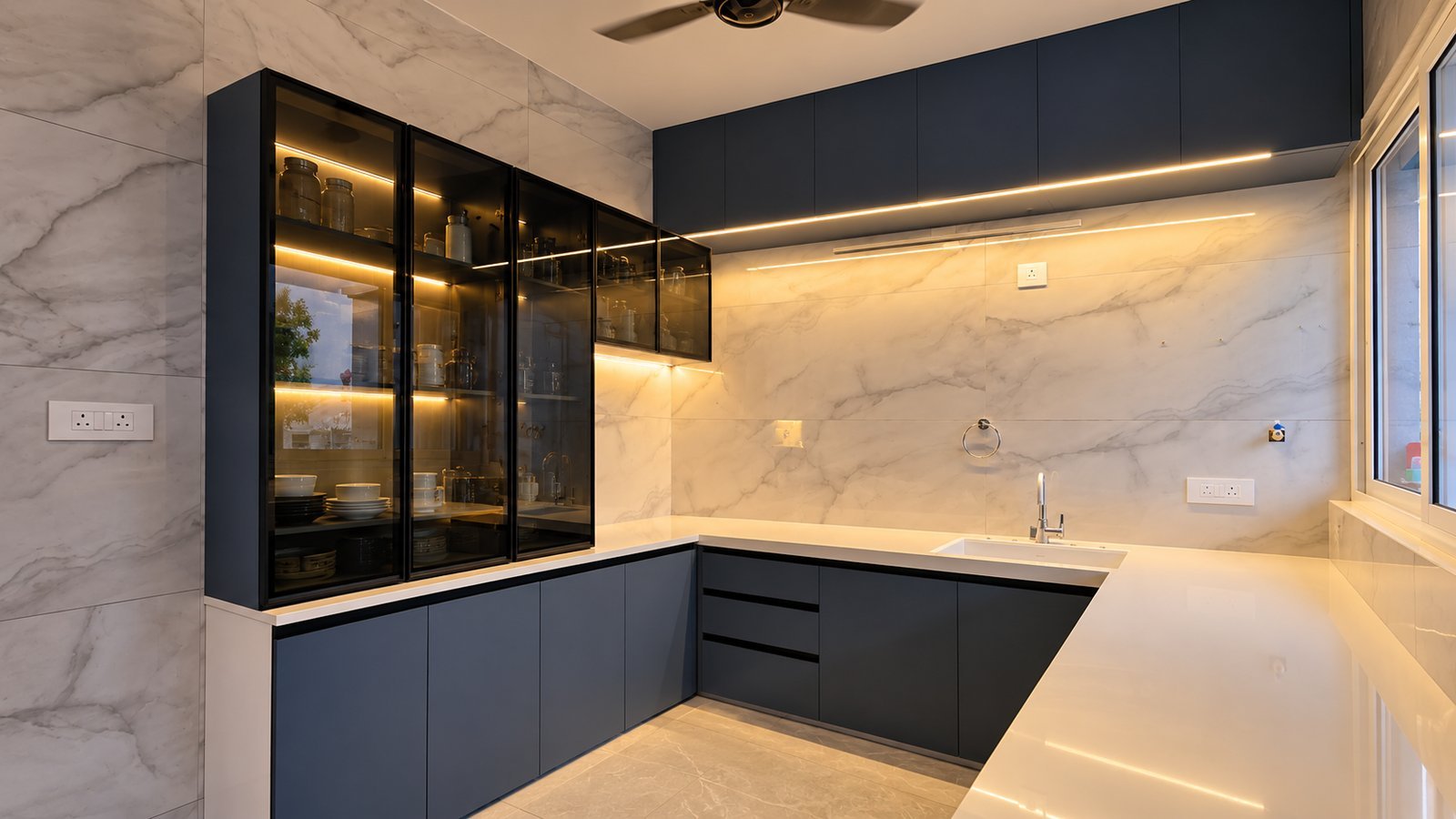 Navy L-Shaped Kitchen with Glass Crockery Unit by Bosk Furniture, Bhavnagar